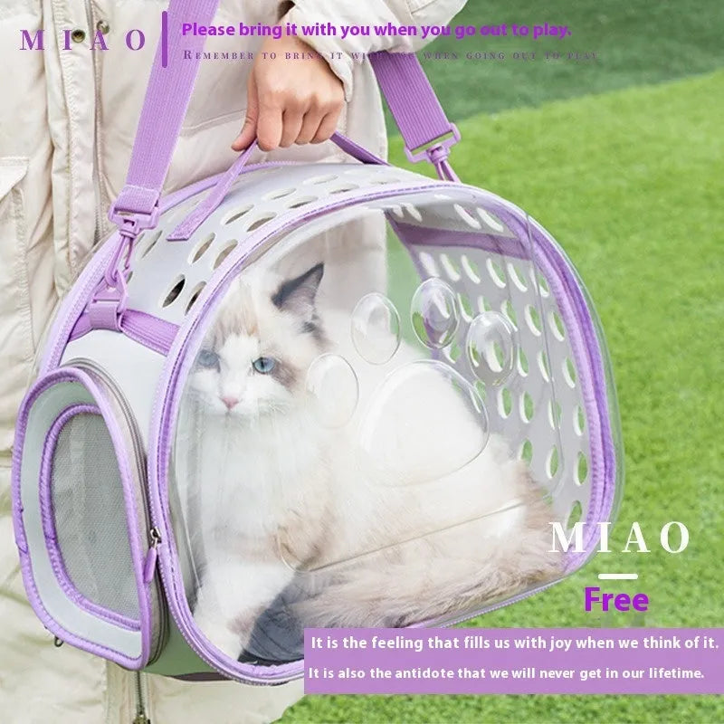 Hard-shell transparent cat carrier backpack in grass green colour, showing large space capsule design.