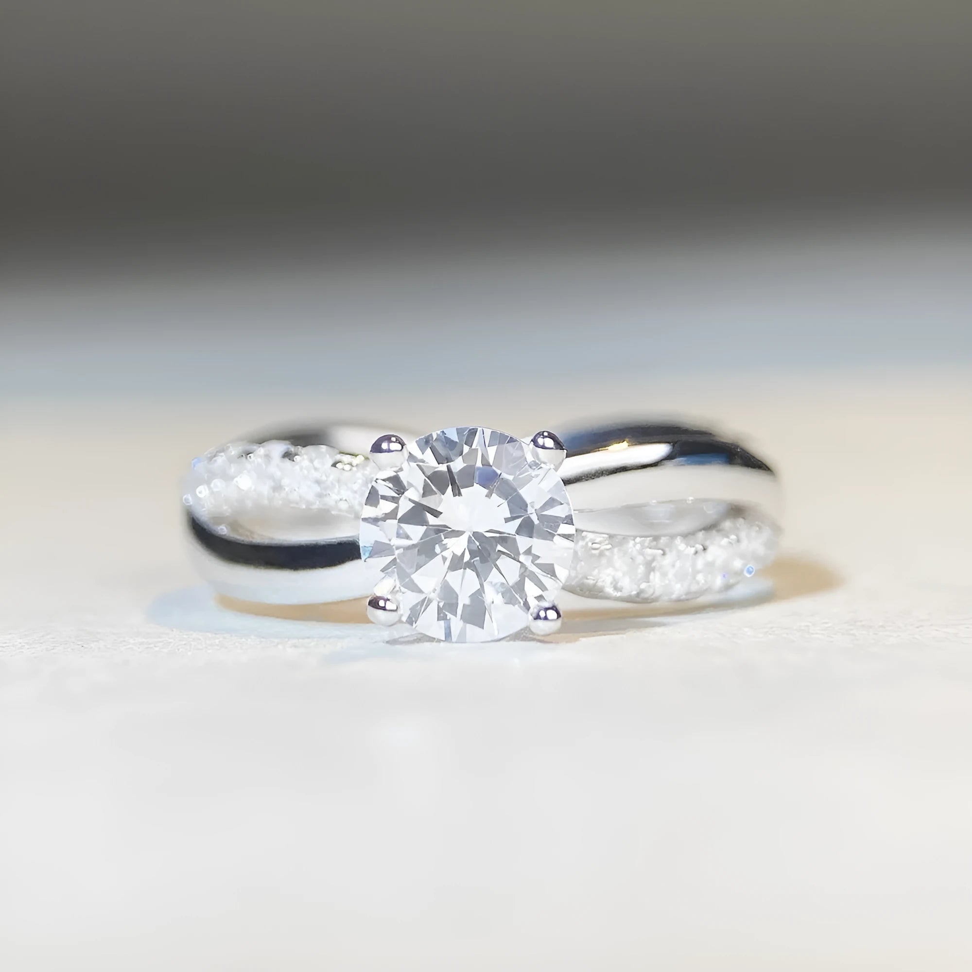 Silver geometric cross ring with 1 karat moissanite centre stone and twisted arm band