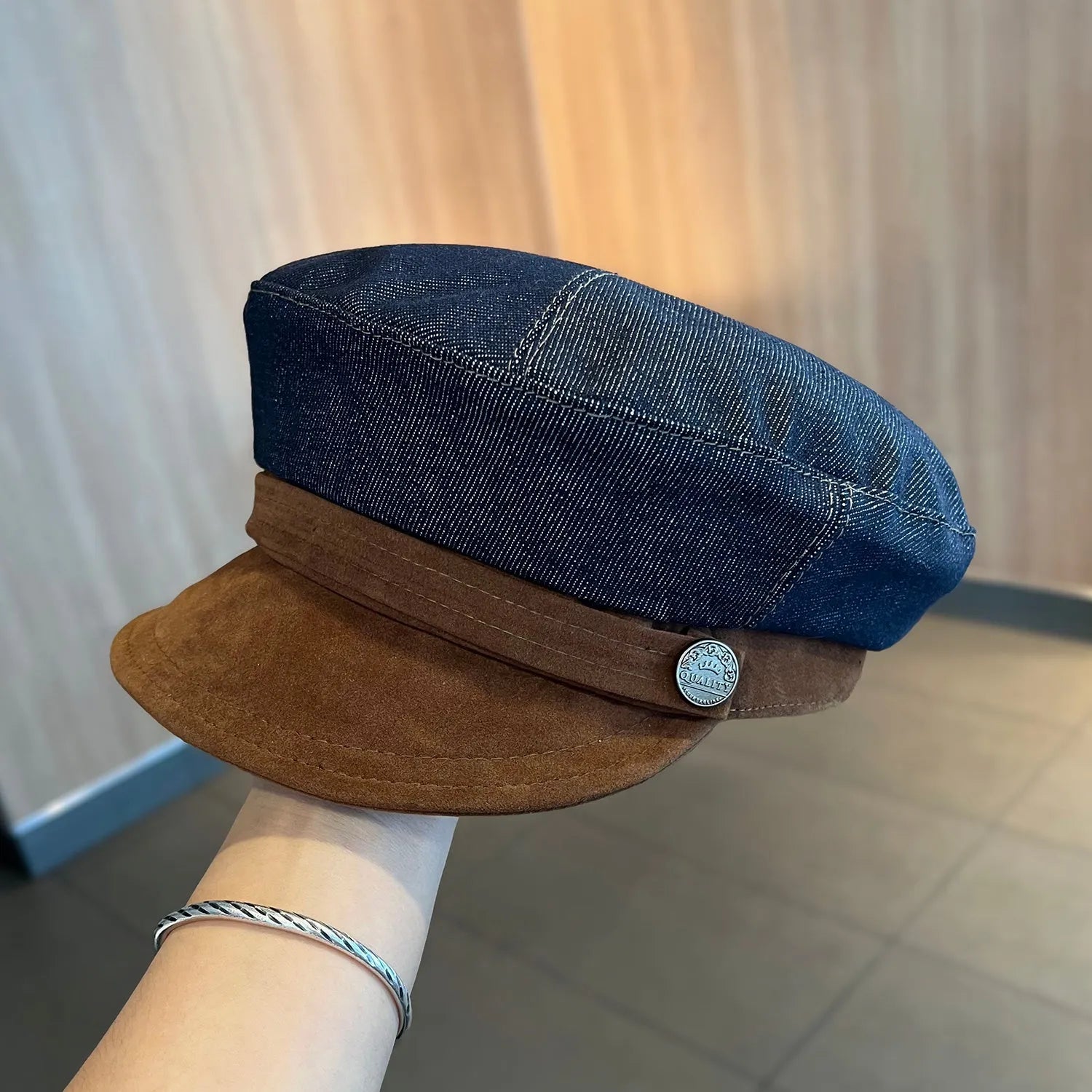 Dark blue denim octagonal newsboy hat with adjustable 54-58cm sizing and colour accent brim options