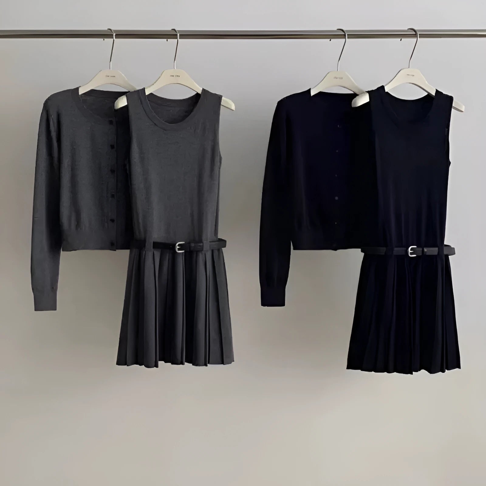 Women's grey knitted vest skirt and cardigan two-piece set with 3D pattern