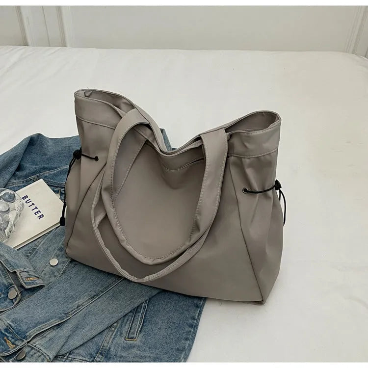 Soft Oxford cloth folding shoulder tote bag in street trend style with shoulder strap