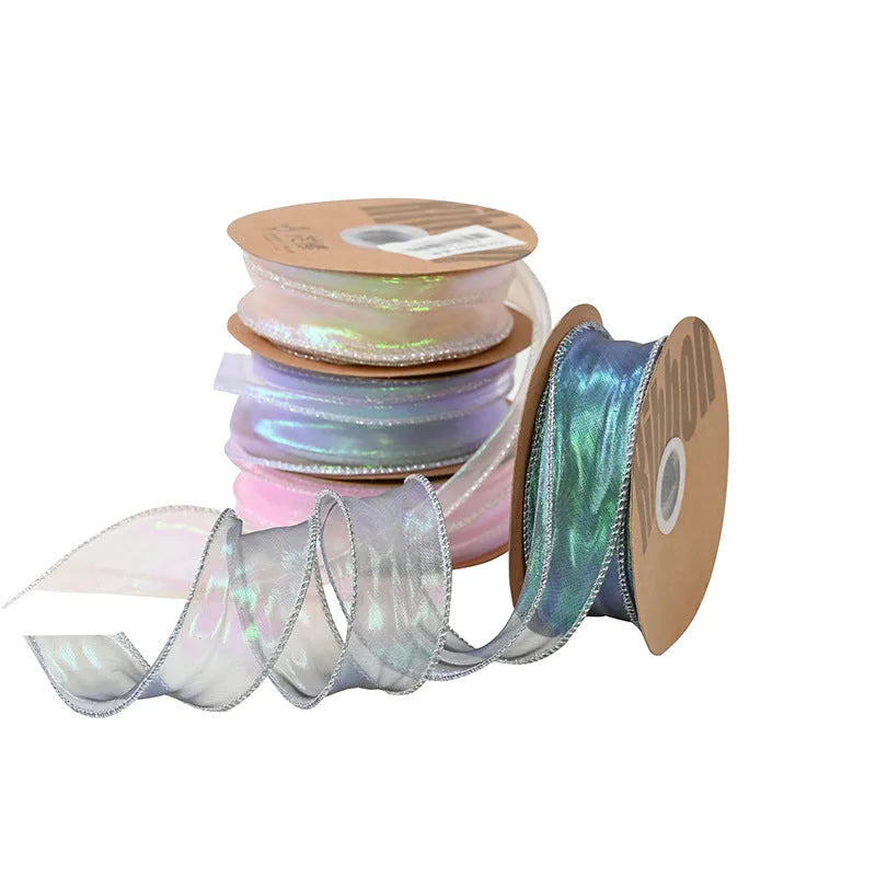 Fishtail yarn wave ribbon in various illusion colours showing 4cm width and textured mesh construction