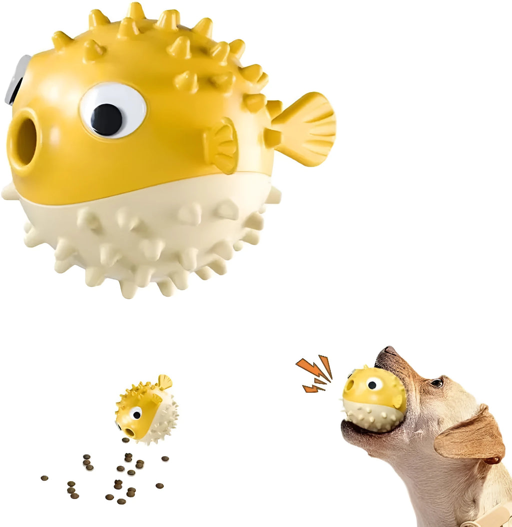 Green fish-shaped interactive dog toy with treat dispensing capability and raised surface particles