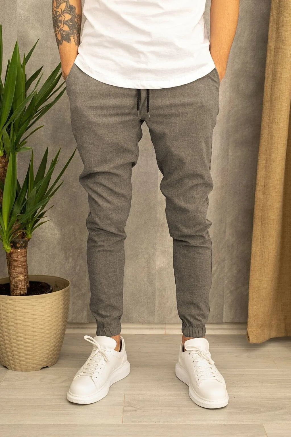 Men's casual plain cotton trousers with belt, tight-fitting pencil pants style, available in black grey khaki