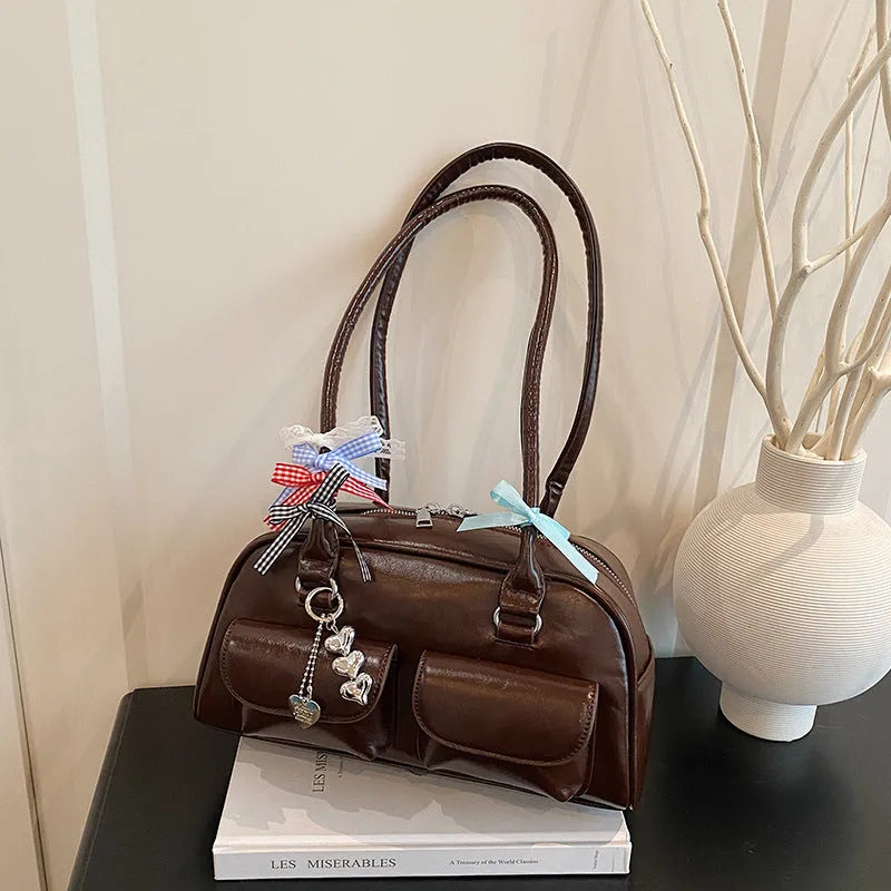 PU leather pillow-shaped flap handbag with double shoulder straps in retro one-shoulder design