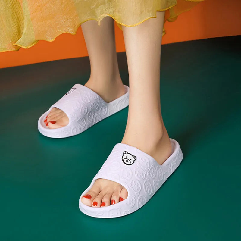Cute bear slippers with non-slip thick soles in light purple, EVA upper, indoor bedroom bathroom footwear