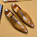Men's black leather shoes with alligator print texture and a silver horse bit buckle.