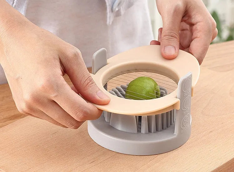 Manual egg cutter three-in-one with stackable parts, PS body, SS304 blades, available in blue, orange, red