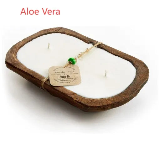 Lavender-coloured wooden basin containing a soy wax aromatherapy candle with three wicks.
