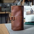 Handmade cow leather vintage wallet showing tape extraction closure in black colour