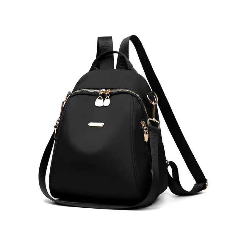 Women's Oxford cloth casual travel backpack in urban simplicity style with sewing line detail and sandwich pocket