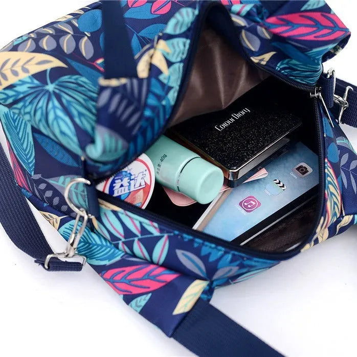 Women's Korean-style nylon shoulder bag in purple with large capacity and sandwich pockets