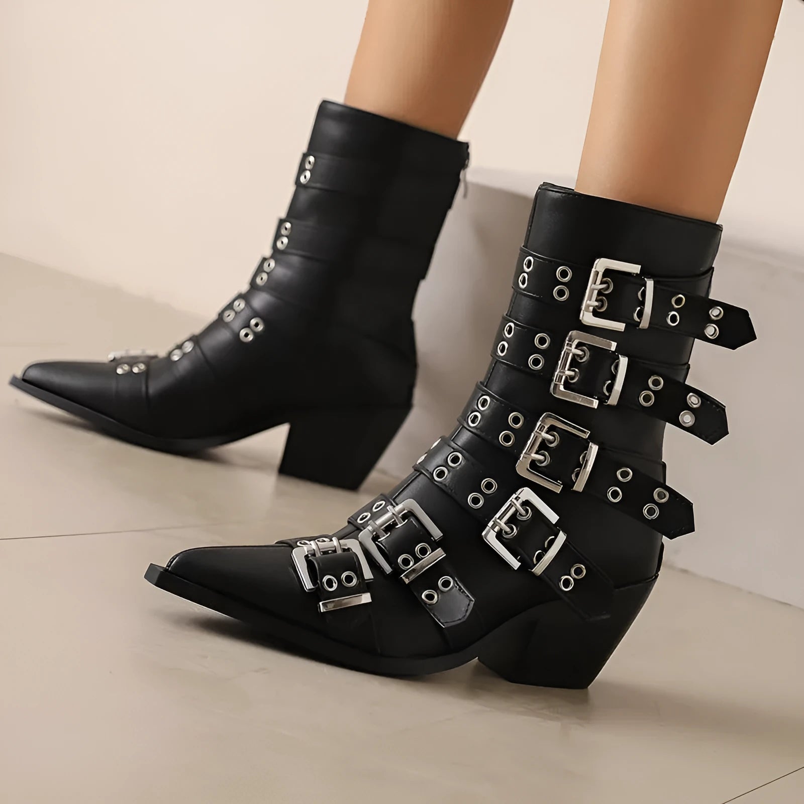 Women's pointed knight boots with belt buckle in black patent leather, side view, chunky heel, size up to 46