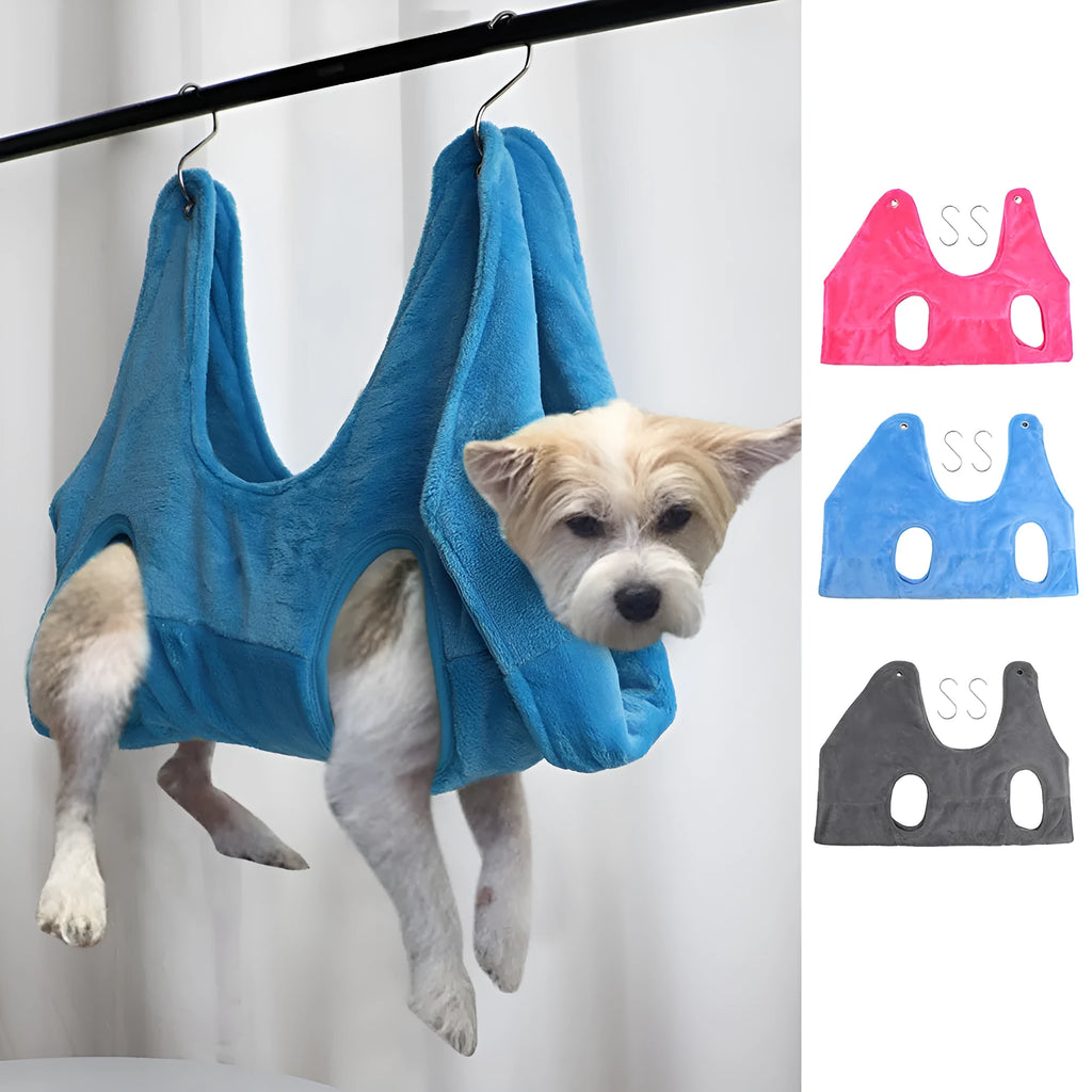 Pet grooming hammock harness in pink with double-layer flannel fabric and reinforced grommets, showing a dog suspended comfortably