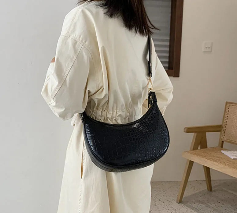 Fairy dumpling bag in PU with crossbody strap, 24cm wide, available in multiple colours
