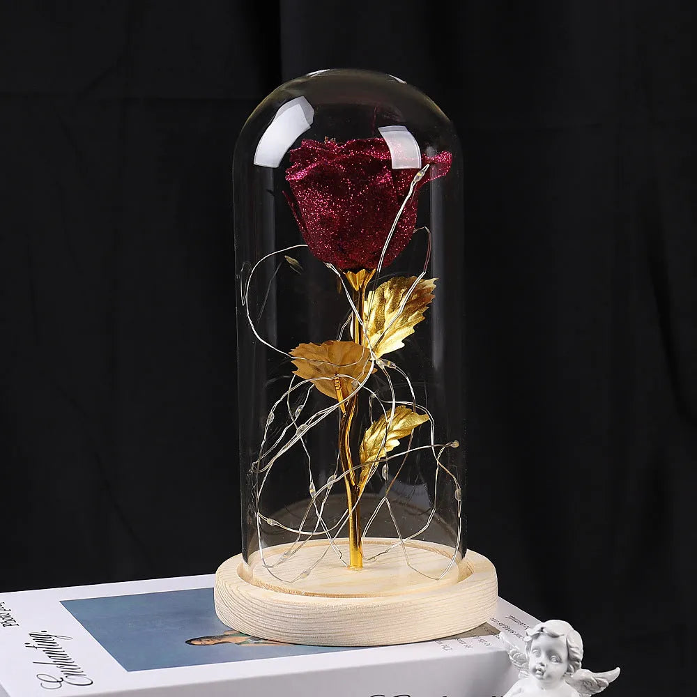 Eternal rose flower LED light in glass cover with warm white glow, six colours available, handmade