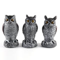 Three-piece set of red artificial PE plastic owl garden ornaments on a white background