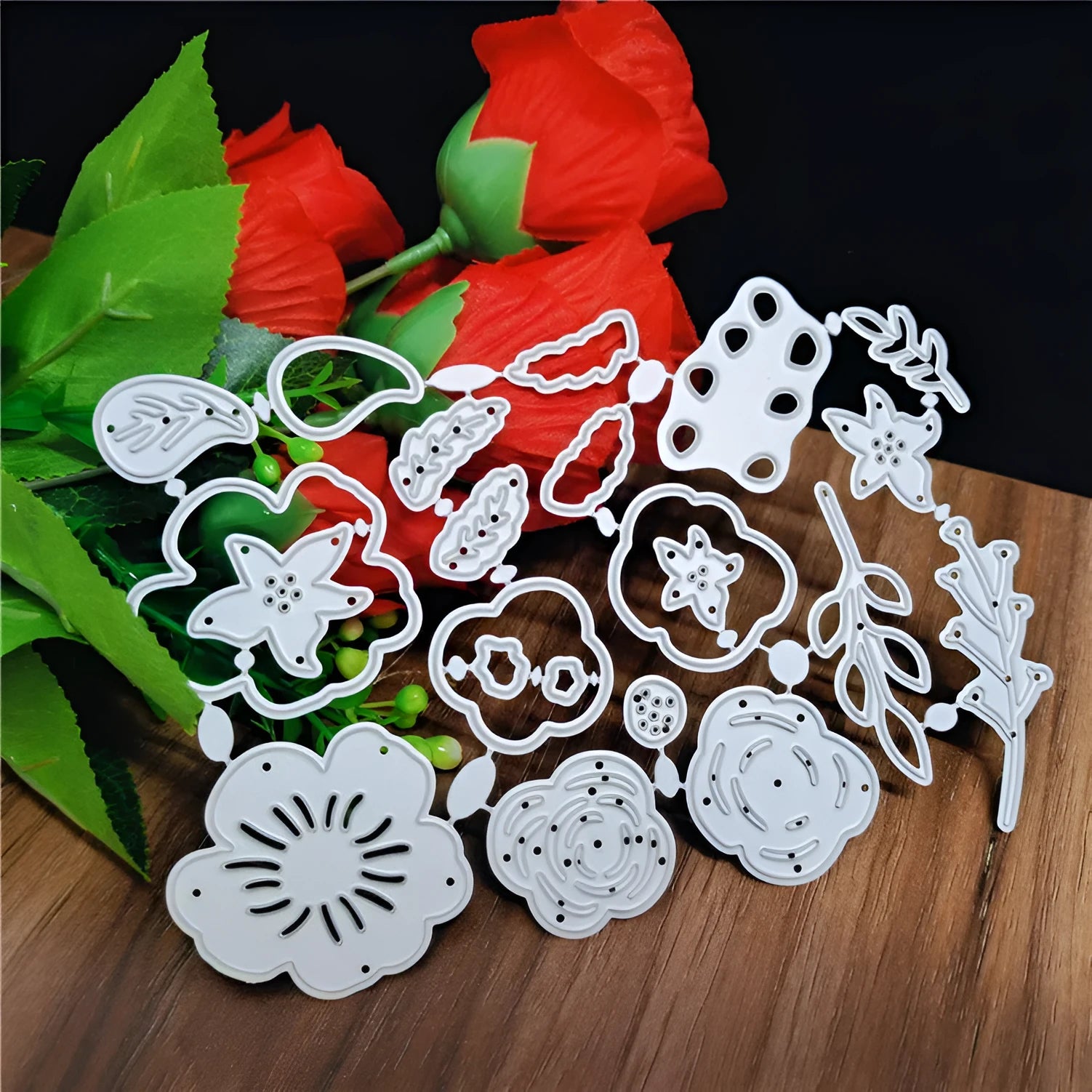 Silver carbon steel flower cutting die for paper crafts measuring 14.3 by 9.9 cm