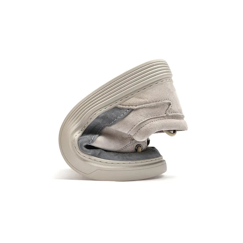 Men's grey casual leather skate shoes with round toe, low top design and rubber soles