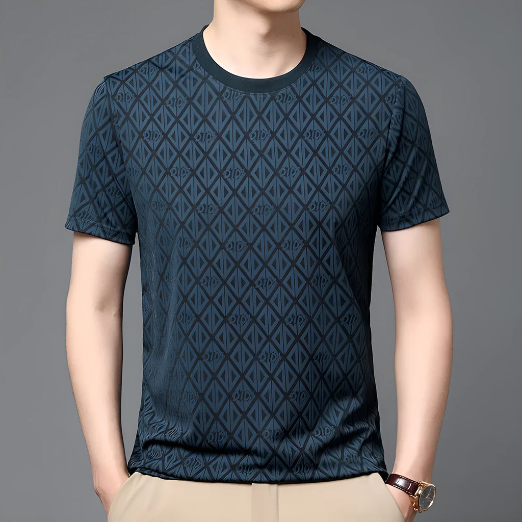 Man wearing a loose fit black round neck short sleeve T-shirt made from Ice Silk fabric.