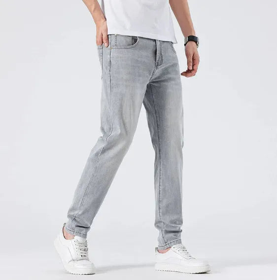 Men's light grey slim straight leg jeans with cotton no-iron finish, straight cut with small tube cuff