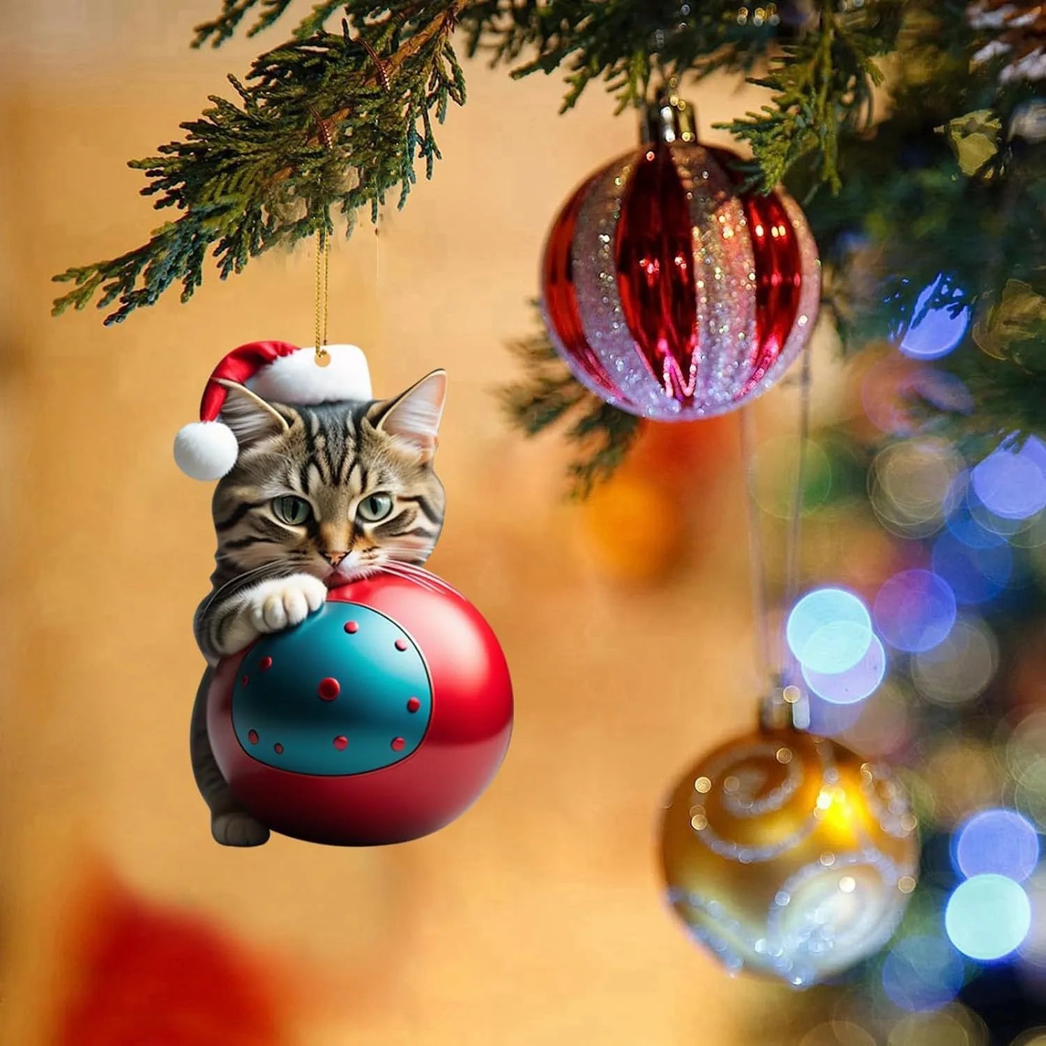 Colourful cartoon-style kitty cat Christmas ornament hanging, made from clear acrylic for car interiors.