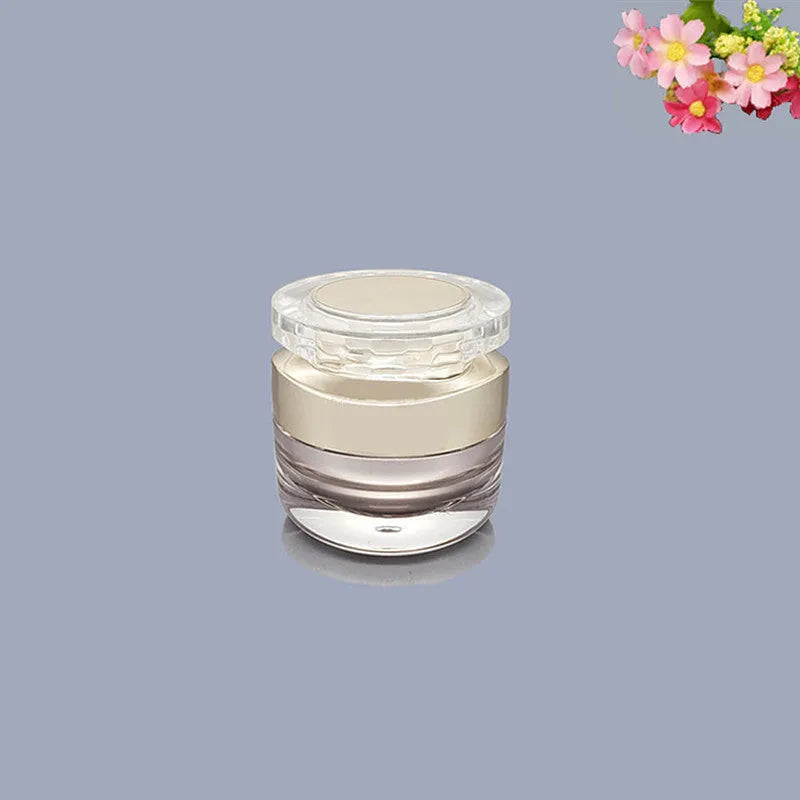 Acrylic cosmetics sub-bottling box with champagne gold and brushed white empty bottles in various sizes