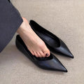French minimalist pointed toe height increasing flat bottom pumps in solid colour