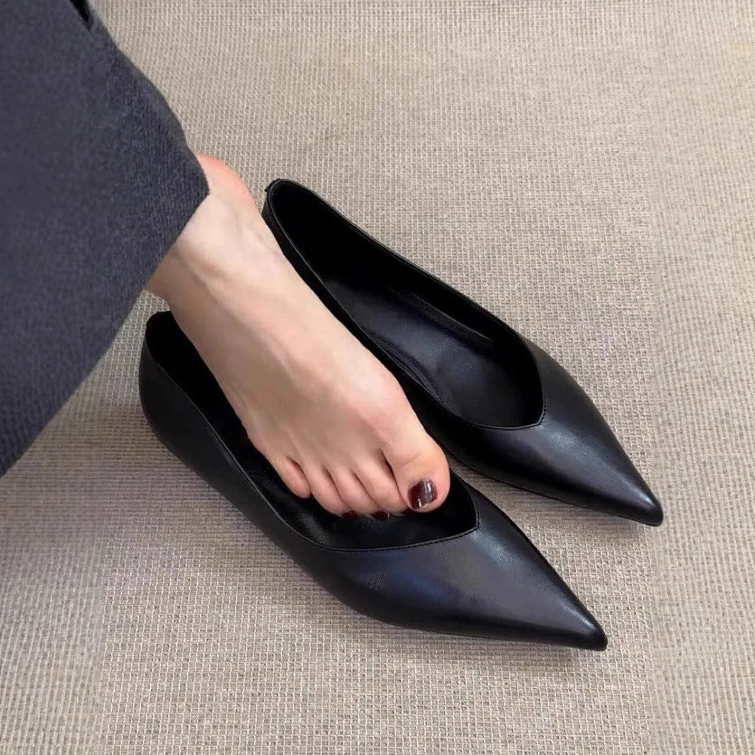 French minimalist pointed toe height increasing flat bottom pumps in solid colour