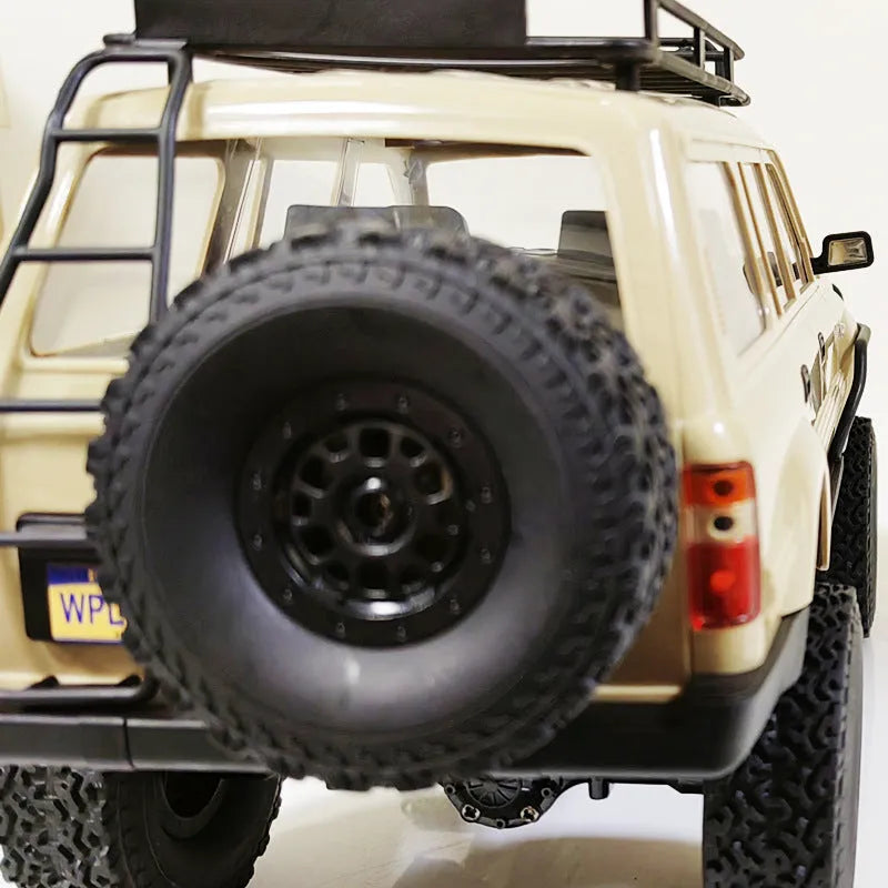 Full Scale LC80 Pickup four-wheel drive off-road remote control car model in khaki with climbing modification