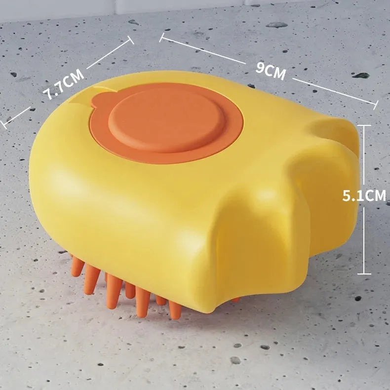Blue pet bath brush with a shampoo reservoir and soft comb head for washing dogs or cats.