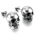 Small punk skull stud earrings in white copper with black colour, push-back closure