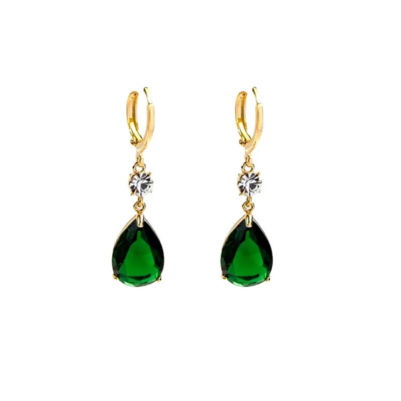 Green geometric teardrop alloy earrings on a white background.