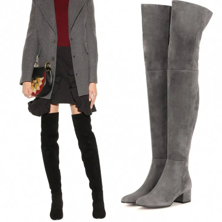 Grey suede women's flat over-the-knee boots with pointed toe and low thick heel.