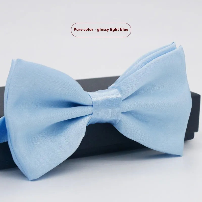 Solid colour polyester bow tie with flat head design measuring 12cm by 6cm