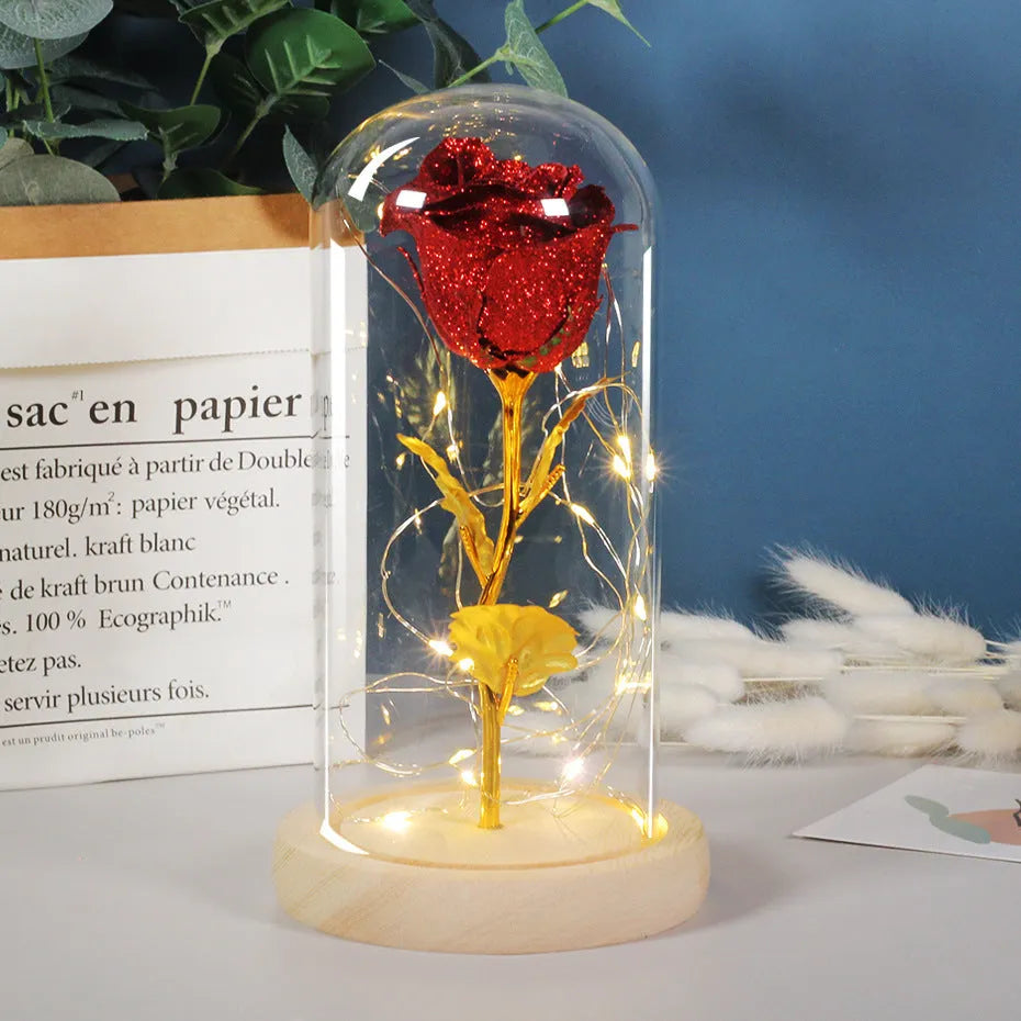 Eternal rose flower LED light in glass cover with warm white glow, six colours available, handmade