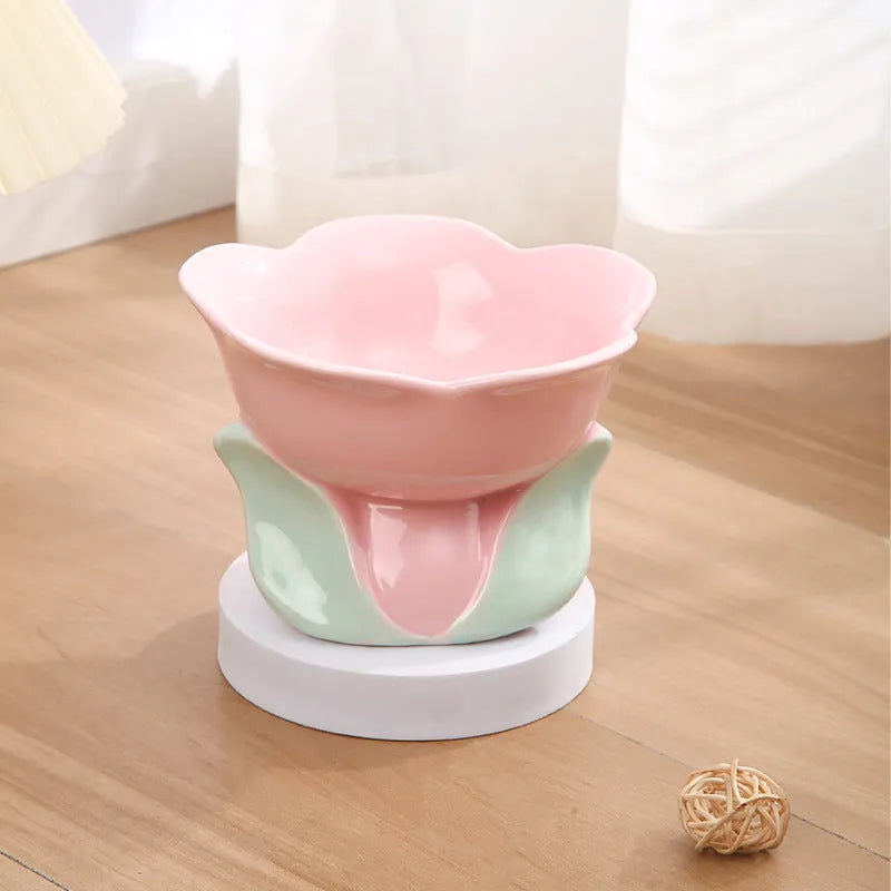 Blue floral patterned ceramic pet bowl with elevated design and non-slip base for cats and small dogs