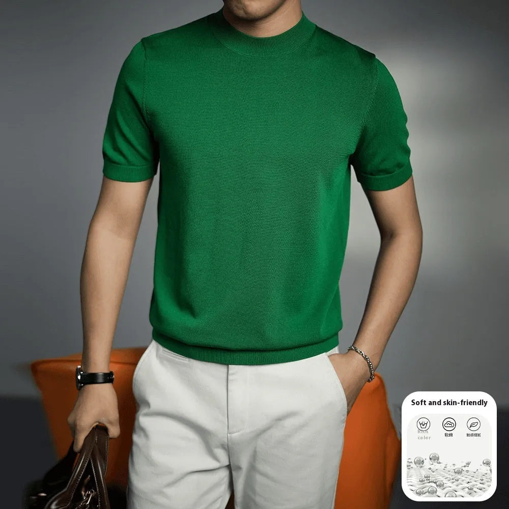 Men's solid colour knitted t-shirt with round neck and short sleeves in a polyester blend fabric.