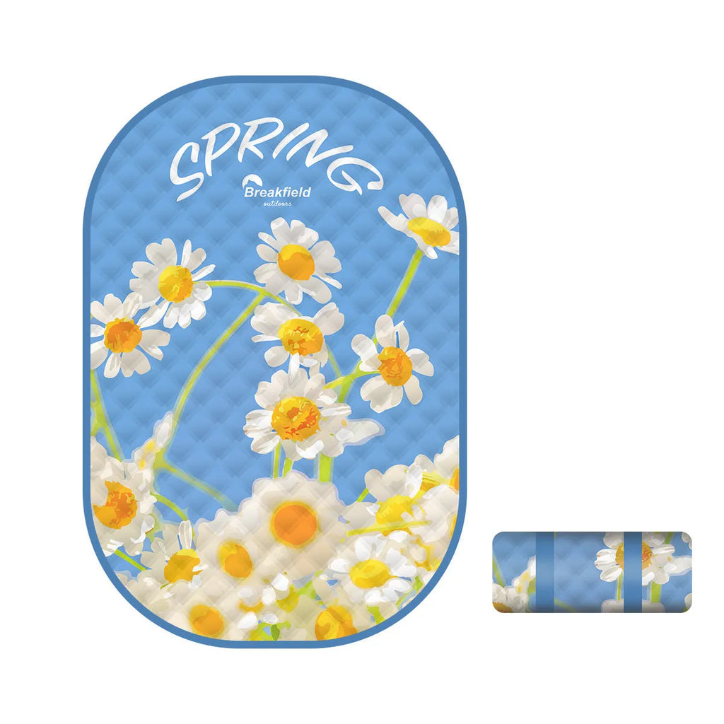 Waterproof outdoor picnic mat with brushed fabric texture showing seasonal colour options