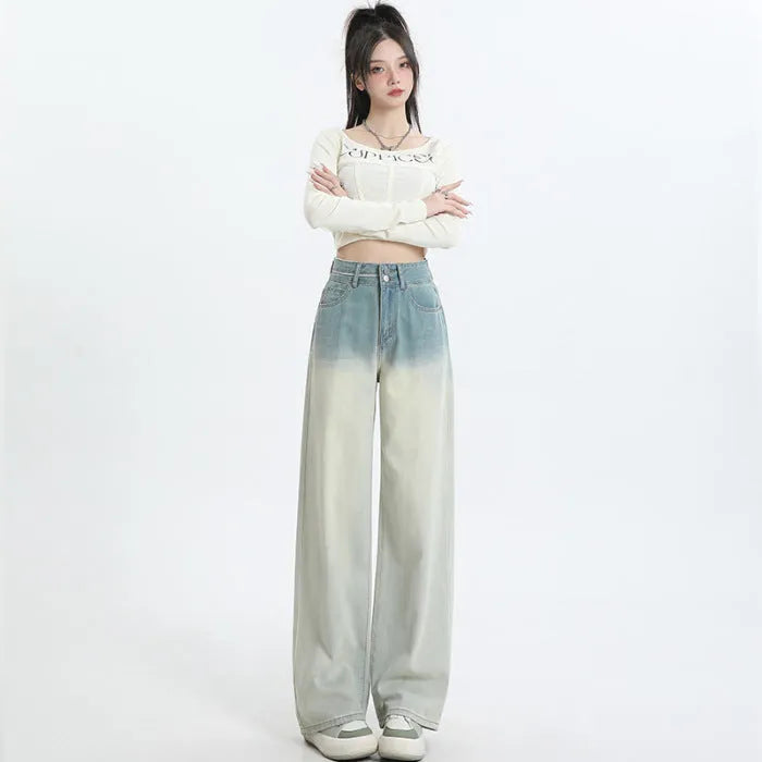 Women's gradient blue straight-leg denim trousers with wide leg silhouette on hanger