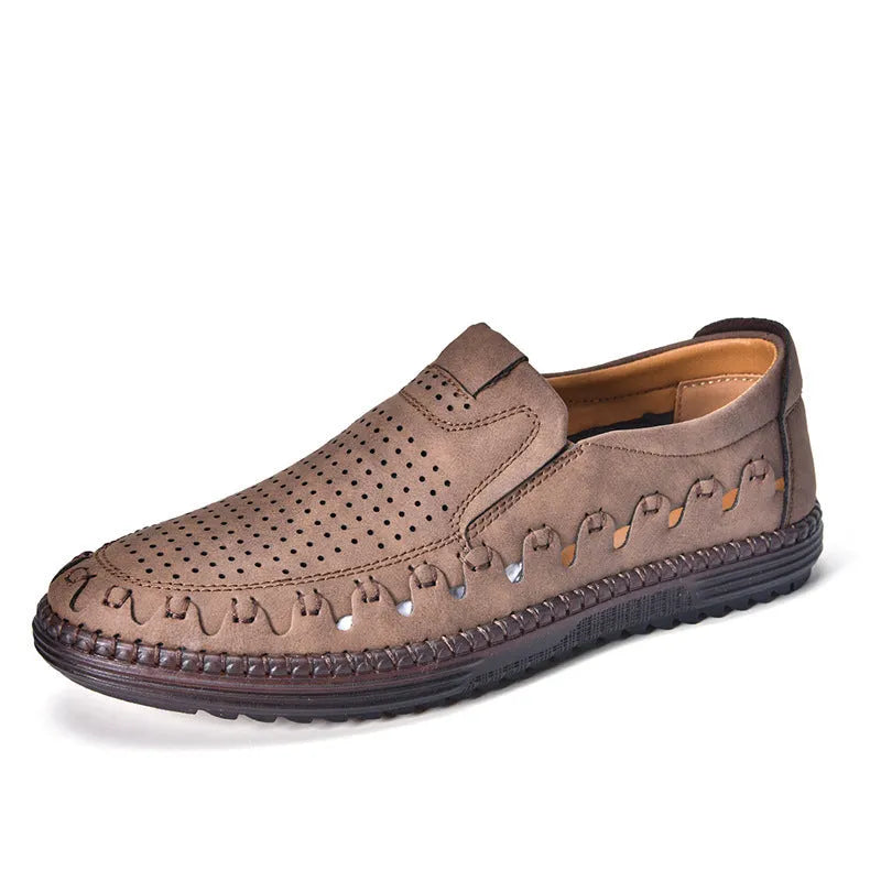 Men's brown slip-on casual leather shoes with round toe and flat heel on a white background.
