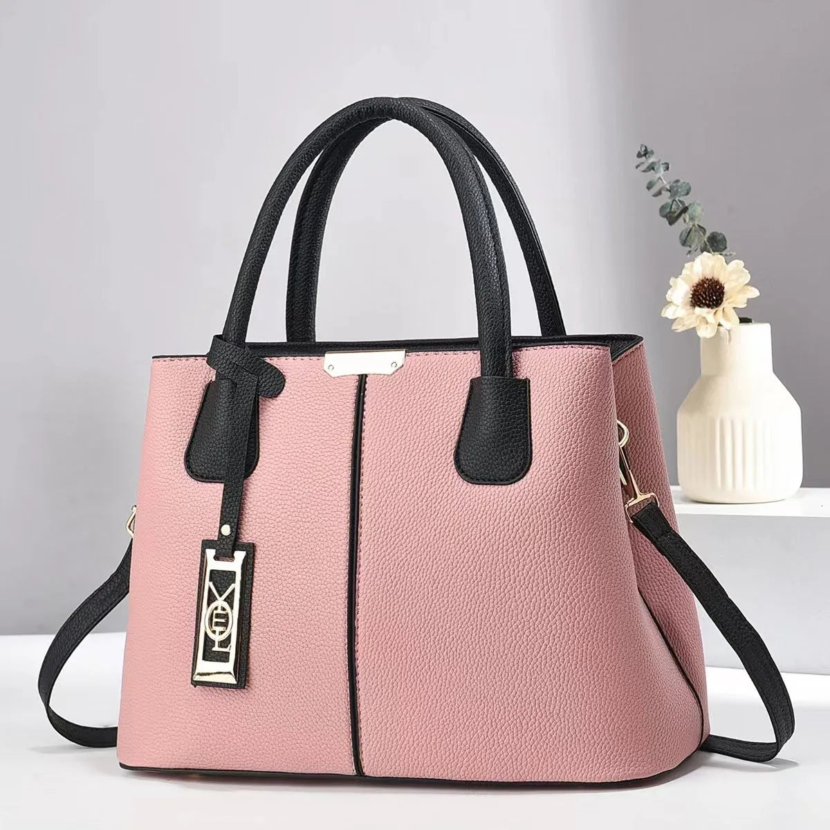 Soft PU fashion handbag with leather shoulder strap in horizontal square shape