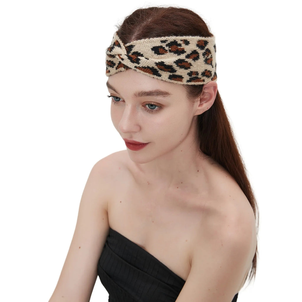 Women's leopard print acrylic bow hair band 22x10cm on a neutral background