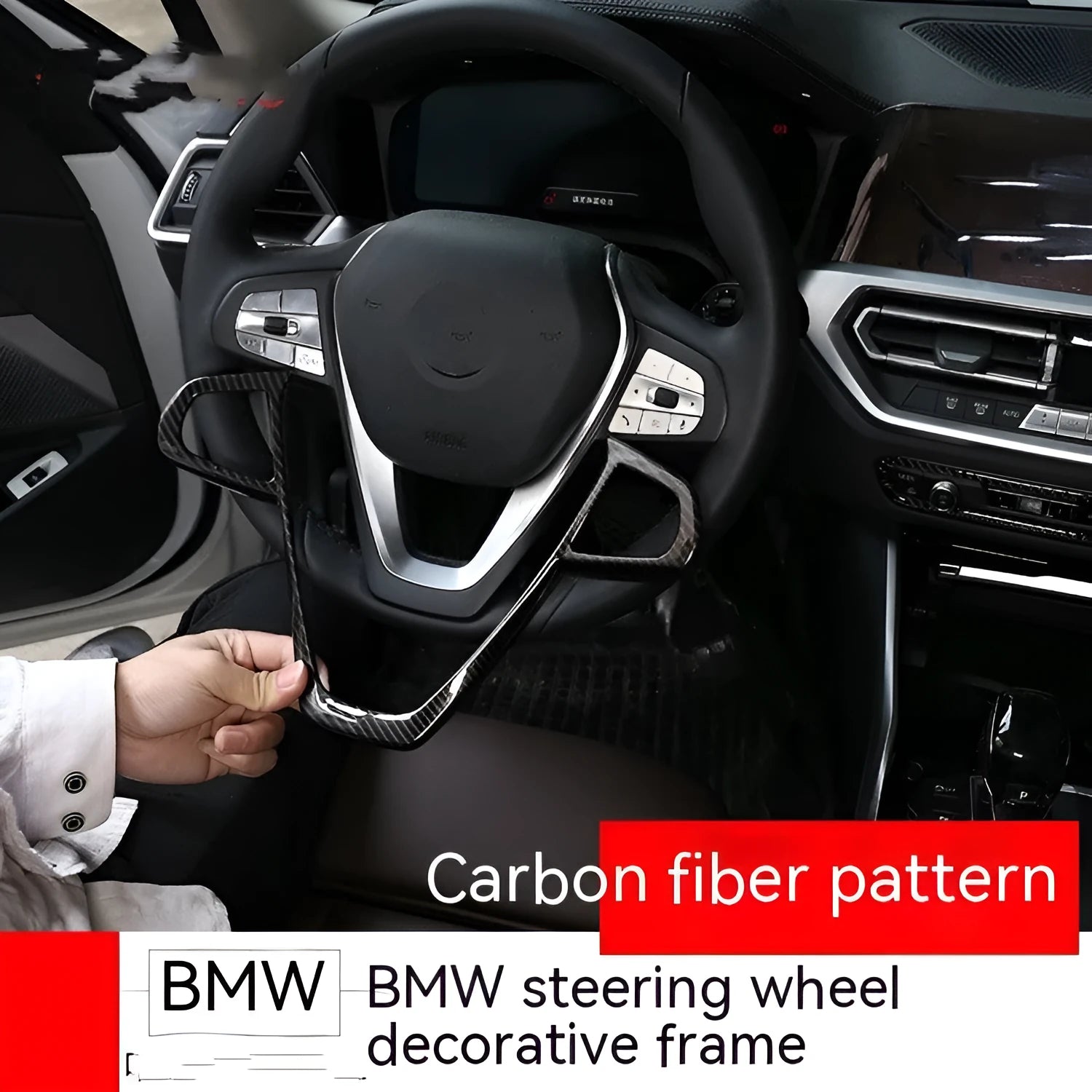 BMW steering wheel button frame decorative trim in black carbon fibre pattern.