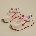Women's low-top platform running shoes in black, red, or grey with lace-up front and flat rubber sole.