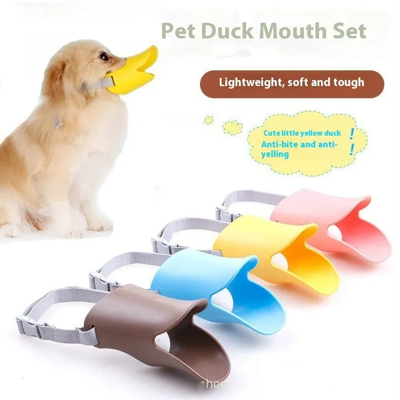 Silicone duckbilled dog muzzle in yellow on a small dog with adjustable strap