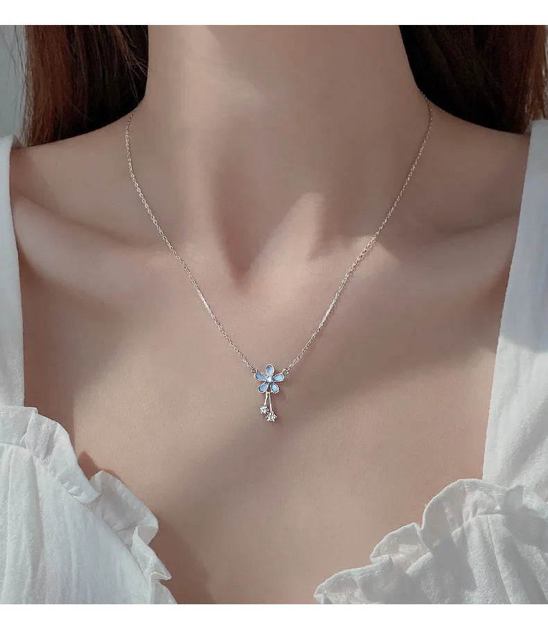999 sterling silver flower pendant necklace with white nano anti-oxidation finish on adjustable cross chain