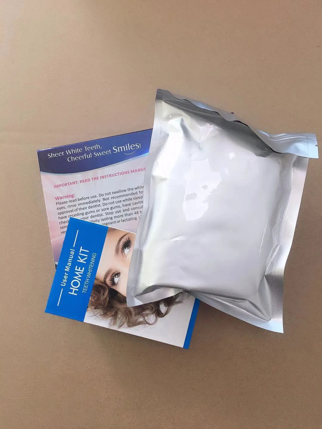 Advance Teeth Whitening LED Kit with white mouth trays and blue LED light unit
