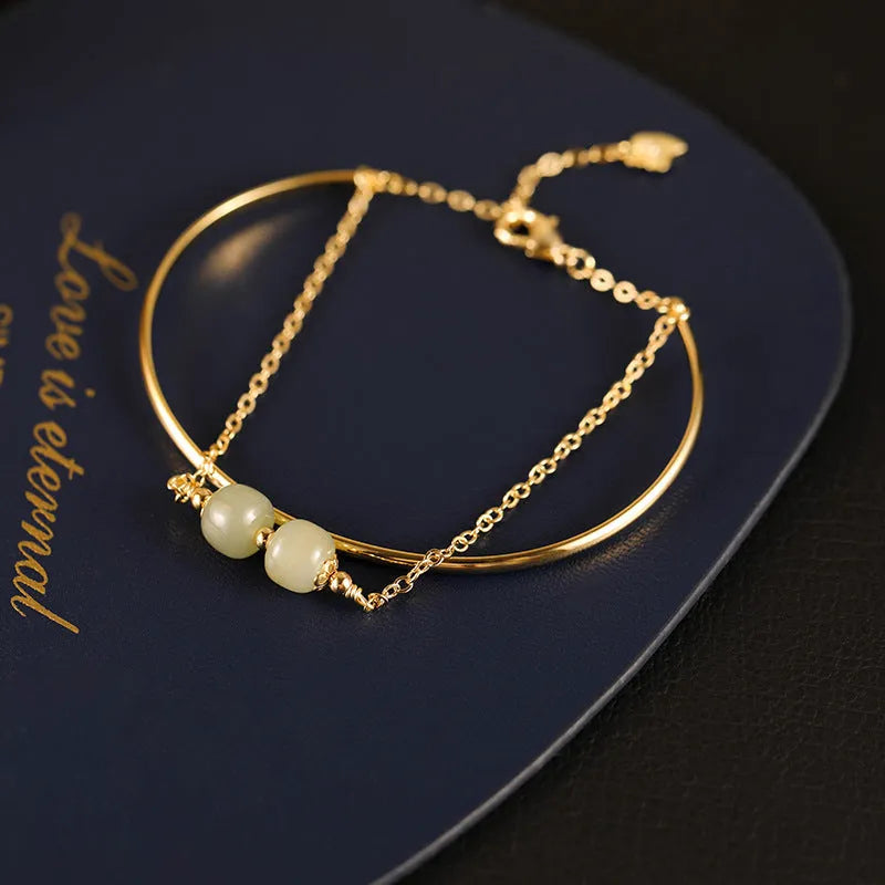 Jade lucky beads bracelet with gold inlay treatment in women's faux two-piece style