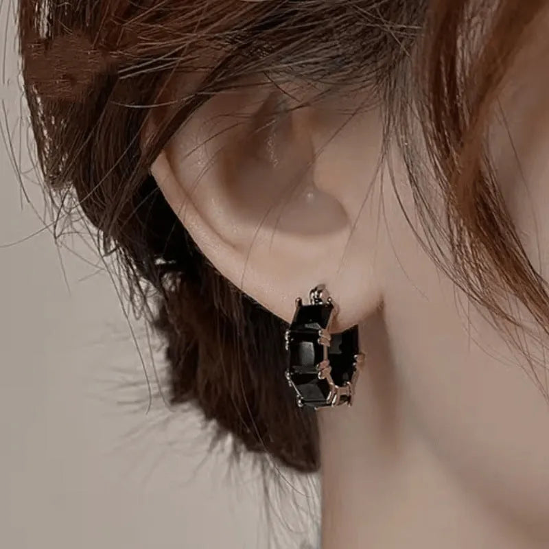 Gold-plated geometric U-shaped earrings with round black zircon crystal stones